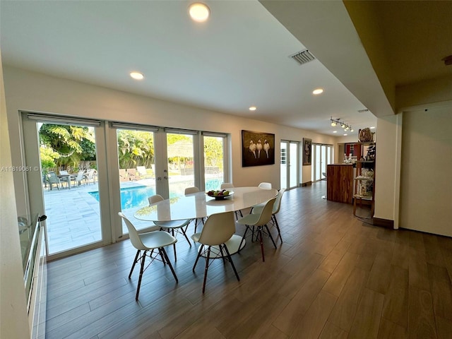 7650 SW 78th Ct, Miami, FL 33143 - dining room featuring plenty of natural light, french doors, wood finished floors, and recessed lighting