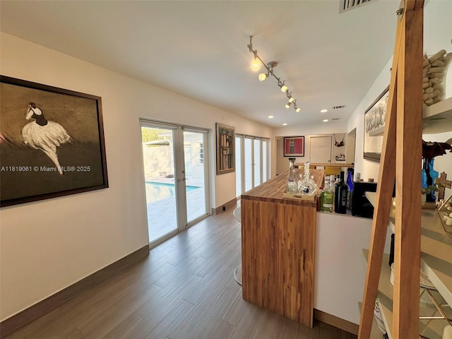 7650 SW 78th Ct, Miami, FL 33143 - kitchen featuring wood finished floors, french doors, recessed lighting, and butcher block countertops