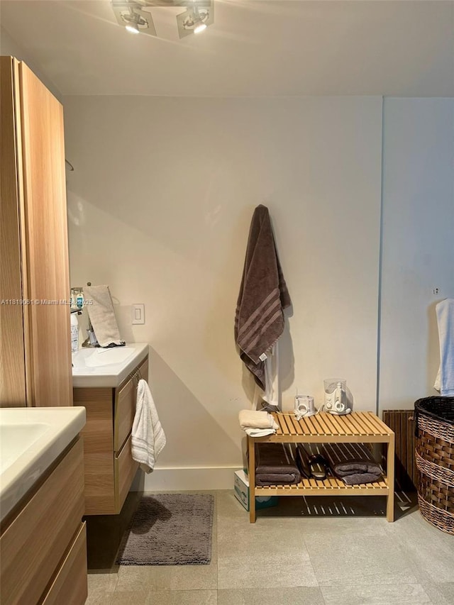 7650 SW 78th Ct, Miami, FL 33143 - bathroom with vanity and tile patterned floors