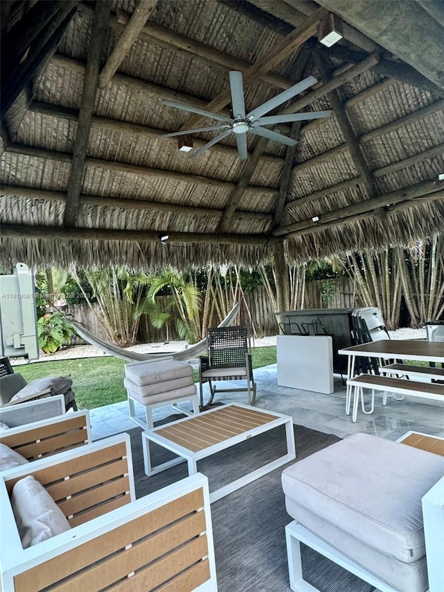 7650 SW 78th Ct, Miami, FL 33143 - wooden deck featuring a gazebo, a ceiling fan, a fenced backyard, and outdoor lounge area