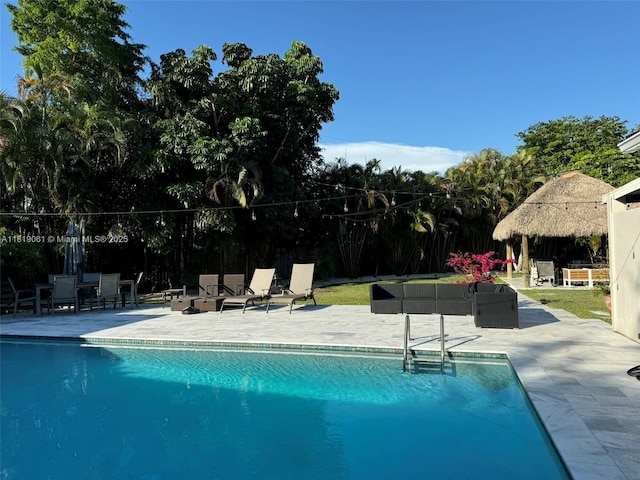 7650 SW 78th Ct, Miami, FL 33143 - swimming pool featuring a patio