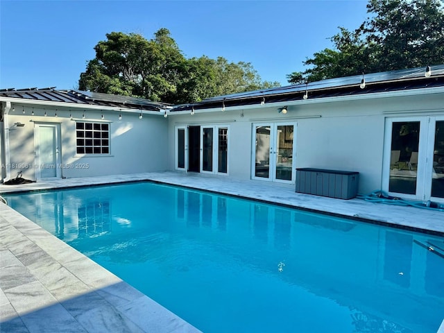 7650 SW 78th Ct, Miami, FL 33143 - outdoor pool with french doors