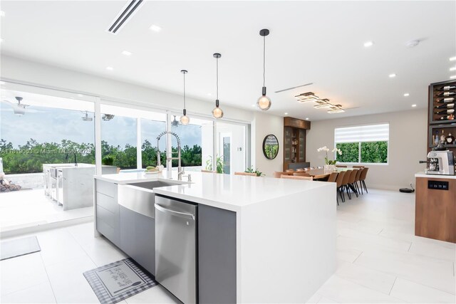 1828 Aspen Ln, Weston, FL 33327 - kitchen featuring stainless steel dishwasher, modern cabinets, light countertops, recessed lighting, and decorative light fixtures
