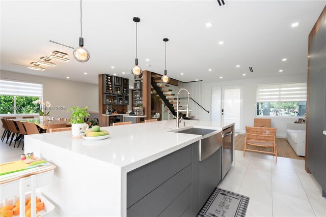 1828 Aspen Ln, Weston, FL 33327 - kitchen featuring modern cabinets, healthy amount of natural light, stainless steel dishwasher, gray cabinetry, and recessed lighting