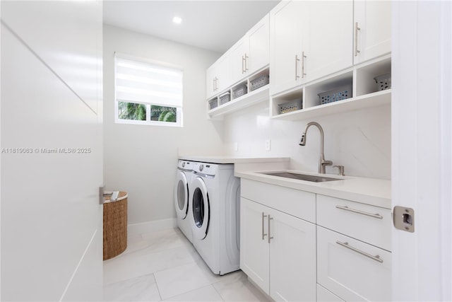 1828 Aspen Ln, Weston, FL 33327 - laundry room with washer and dryer, cabinet space, and light marble finish floors