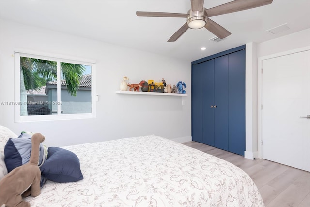1828 Aspen Ln, Weston, FL 33327 - bedroom featuring light wood-type flooring, a closet, recessed lighting, and a ceiling fan