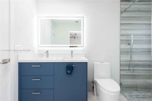 1828 Aspen Ln, Weston, FL 33327 - bathroom with double vanity and a ceiling fan