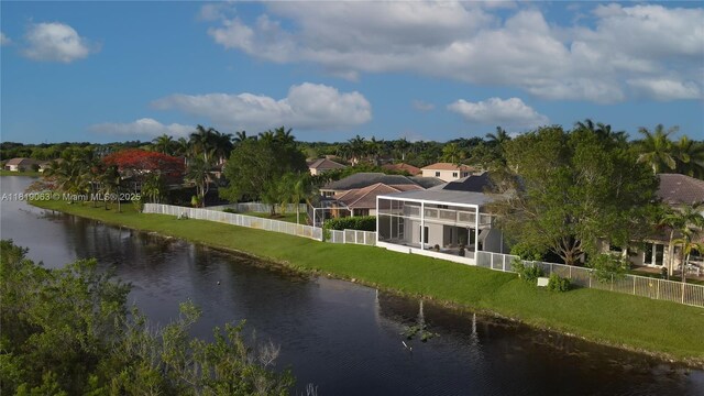 1828 Aspen Ln, Weston, FL 33327 - water view featuring a fenced backyard and nearby suburban area