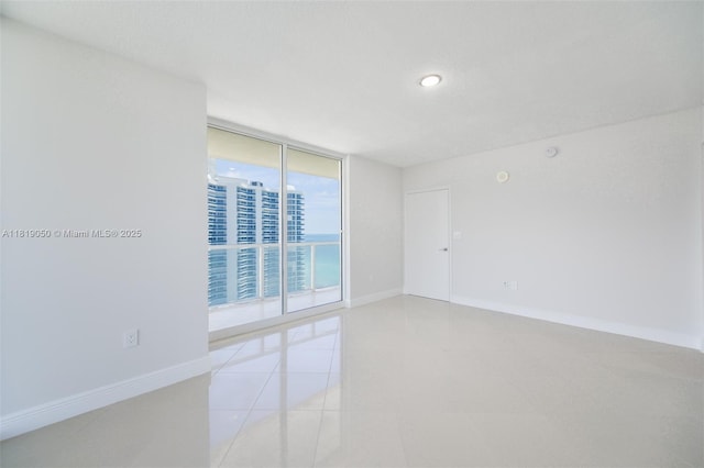 16699 Collins Ave Unit 2107, Sunny Isles Beach, FL 33160 - empty room featuring floor to ceiling windows and recessed lighting