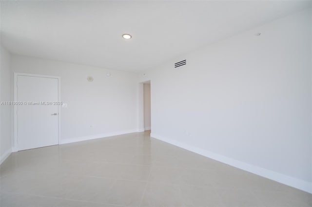 16699 Collins Ave Unit 2107, Sunny Isles Beach, FL 33160 - empty room with light tile patterned floors and recessed lighting