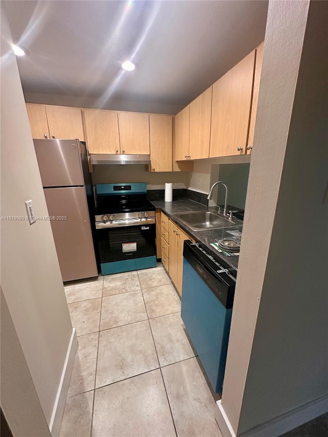 2935 NE 163rd St Unit 3P, North Miami Beach, FL 33160 - kitchen with appliances with stainless steel finishes, light brown cabinets, under cabinet range hood, dark countertops, and light tile patterned floors