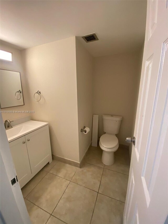 2935 NE 163rd St Unit 3P, North Miami Beach, FL 33160 - bathroom with vanity and tile patterned floors