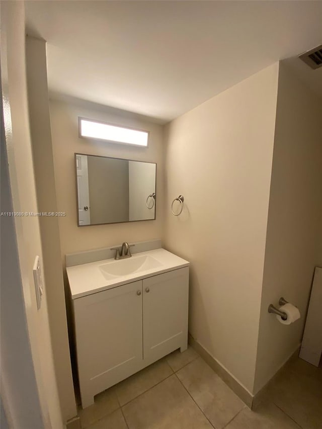 2935 NE 163rd St Unit 3P, North Miami Beach, FL 33160 - bathroom with vanity and tile patterned floors