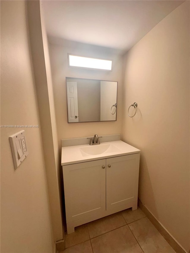2935 NE 163rd St Unit 3P, North Miami Beach, FL 33160 - bathroom with tile patterned flooring and vanity