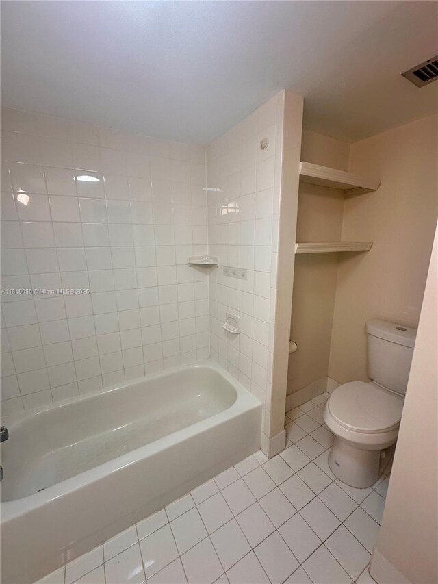 2935 NE 163rd St Unit 3P, North Miami Beach, FL 33160 - bathroom with tile patterned floors and shower / washtub combination