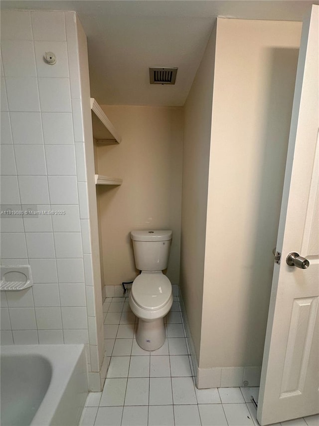2935 NE 163rd St Unit 3P, North Miami Beach, FL 33160 - full bathroom featuring toilet and tile patterned flooring