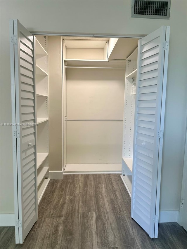 2935 NE 163rd St Unit 3P, North Miami Beach, FL 33160 - spacious closet featuring wood finished floors