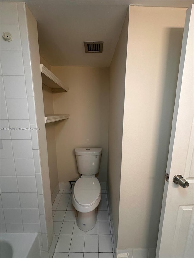 2935 NE 163rd St Unit 3P, North Miami Beach, FL 33160 - full bathroom with a tub to relax in and tile patterned floors