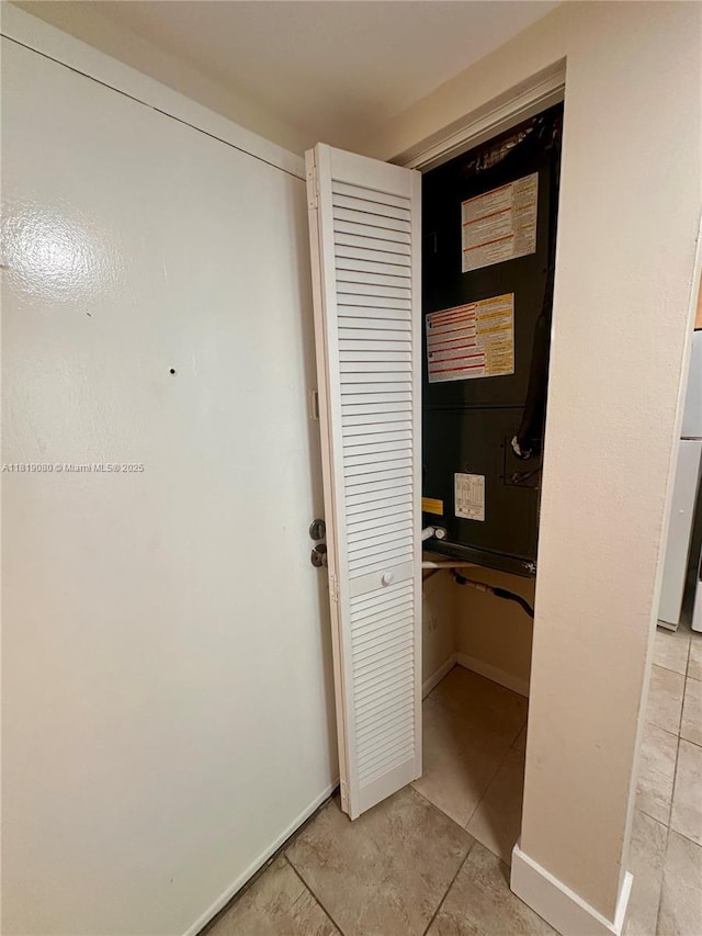 2935 NE 163rd St Unit 3P, North Miami Beach, FL 33160 - hall featuring light tile patterned flooring