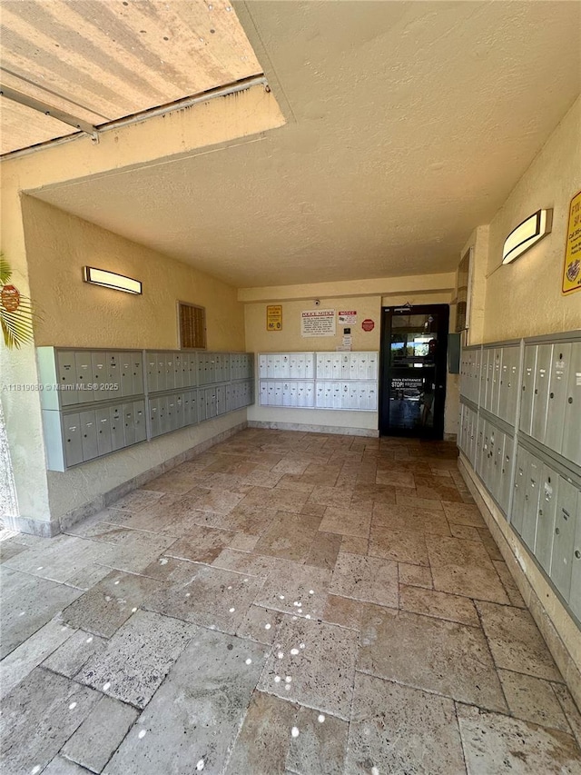 2935 NE 163rd St Unit 3P, North Miami Beach, FL 33160 - surrounding community featuring mail area and a textured ceiling