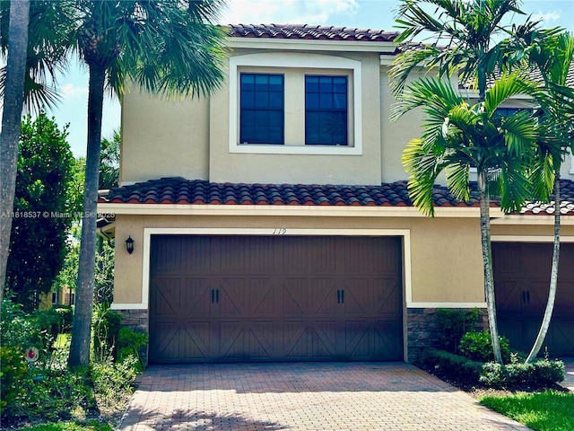 119 Riverwalk Cir E, Plantation, FL 33325 - garage featuring driveway