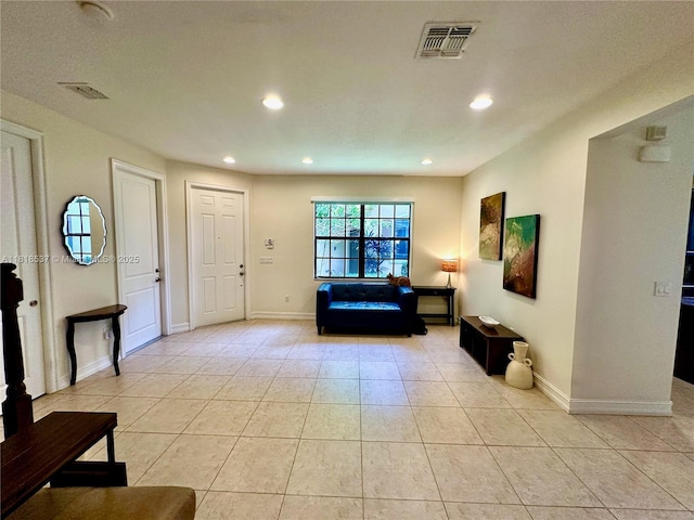 119 Riverwalk Cir E, Plantation, FL 33325 - foyer featuring light tile patterned floors and recessed lighting
