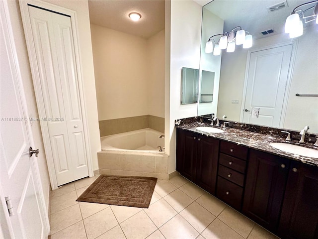 119 Riverwalk Cir E, Plantation, FL 33325 - bathroom featuring tile patterned flooring, a bath, and double vanity