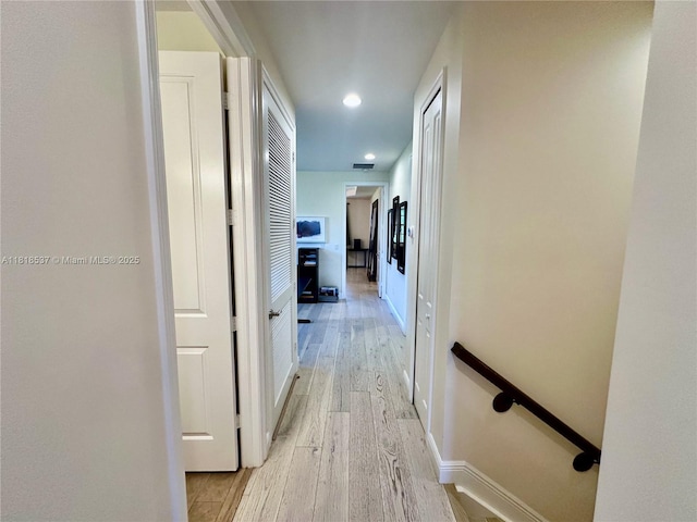 119 Riverwalk Cir E, Plantation, FL 33325 - corridor with light wood finished floors, an upstairs landing, and recessed lighting