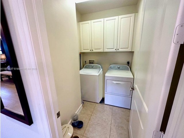 119 Riverwalk Cir E, Plantation, FL 33325 - laundry area with washer and clothes dryer, cabinet space, and light tile patterned floors