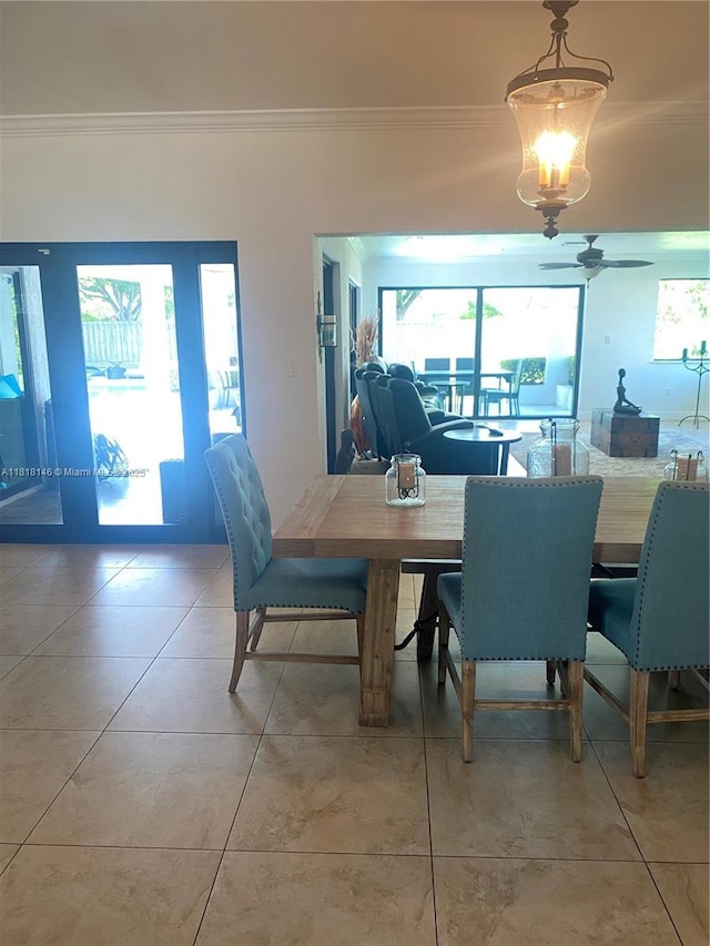 12780 SW 187th St, Miami, FL 33177 - dining room with crown molding, light tile patterned floors, and a ceiling fan