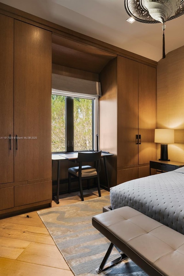 bedroom with light wood-type flooring