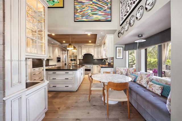 dining space with light wood-type flooring