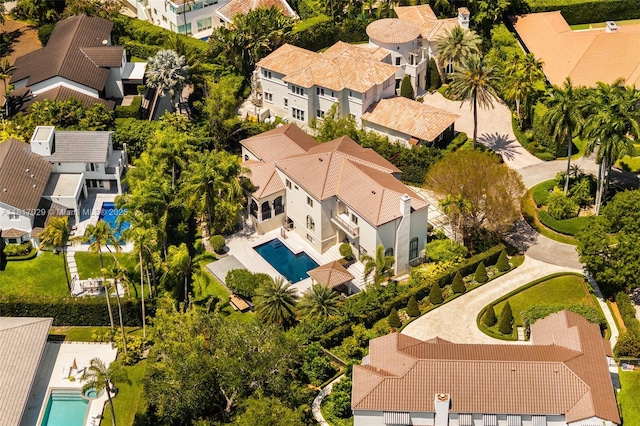 aerial perspective of suburban area with a pool