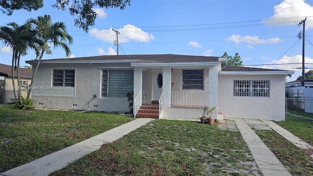130 W 60th St, Hialeah, FL 33012 - bungalow with crawl space, covered porch, stucco siding, and a shingled roof