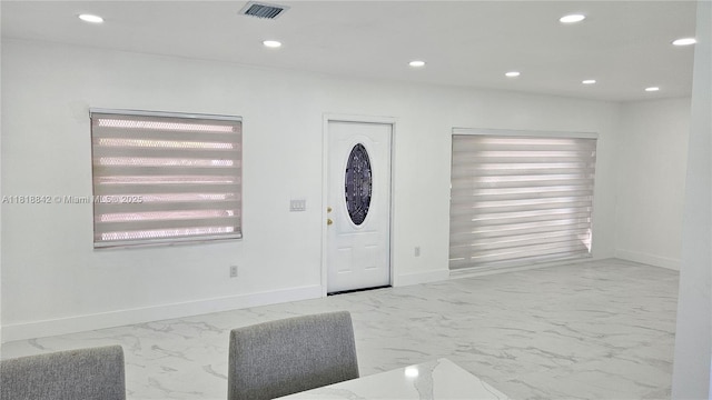 130 W 60th St, Hialeah, FL 33012 - entryway with marble finish floors, recessed lighting, and baseboards