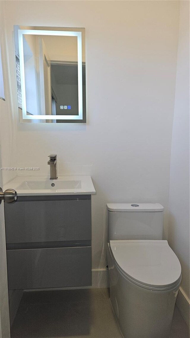 130 W 60th St, Hialeah, FL 33012 - half bath with vanity and toilet