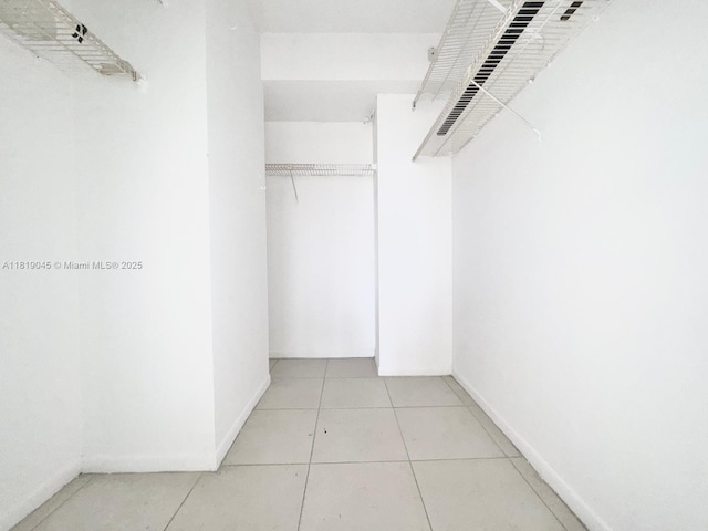 600 Three Islands Blvd Unit 620, Hallandale Beach, FL 33009 - spacious closet featuring light tile patterned flooring