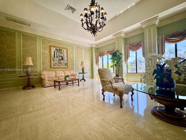600 Three Islands Blvd Unit 620, Hallandale Beach, FL 33009 - living area featuring healthy amount of natural light, a chandelier, and ornamental molding