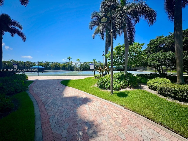 600 Three Islands Blvd Unit 620, Hallandale Beach, FL 33009 - view of community with a tennis court
