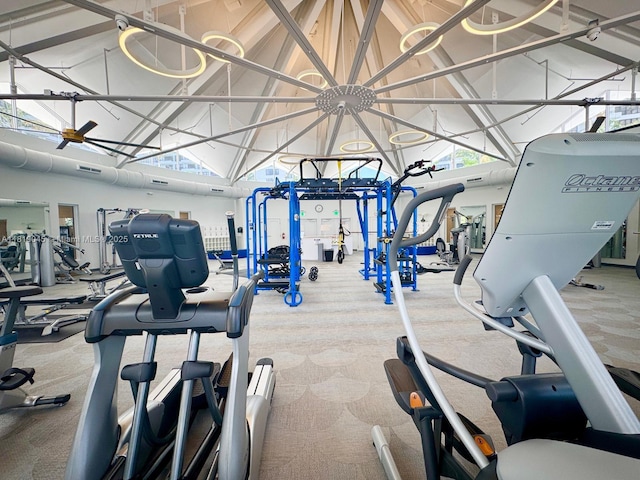 600 Three Islands Blvd Unit 620, Hallandale Beach, FL 33009 - exercise room with carpet flooring and high vaulted ceiling