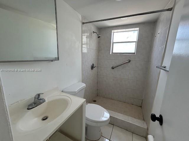 515 SW 3rd St Unit 12, Miami, FL 33130 - bathroom with toilet, a tile shower, vanity, and tile patterned floors