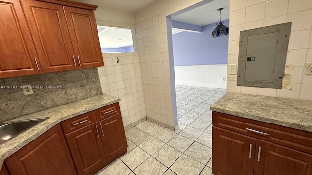 9455 W Flagler St Unit C308, Miami, FL 33174 - kitchen featuring electric panel, tile walls, light tile patterned floors, a sink, and decorative backsplash