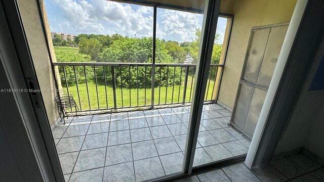 9455 W Flagler St Unit C308, Miami, FL 33174 - unfurnished sunroom with healthy amount of natural light