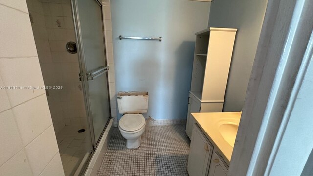 9455 W Flagler St Unit C308, Miami, FL 33174 - full bathroom with vanity, a shower stall, toilet, and tile patterned flooring