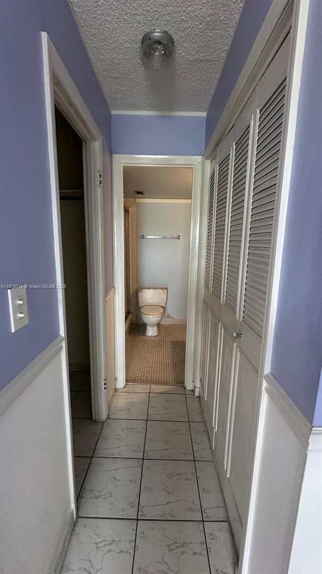 9455 W Flagler St Unit C308, Miami, FL 33174 - corridor featuring light marble finish floors