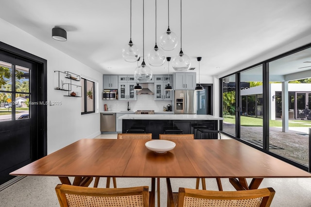 7921 SW 100th St, Miami, FL 33156 - dining space featuring healthy amount of natural light and dark speckled floor