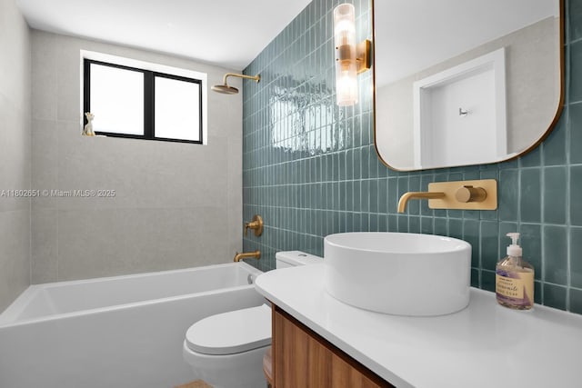 7921 SW 100th St, Miami, FL 33156 - bathroom featuring tile walls, shower / bathtub combination, and vanity
