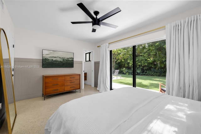 7921 SW 100th St, Miami, FL 33156 - bedroom with a wainscoted wall, a ceiling fan, and access to outside