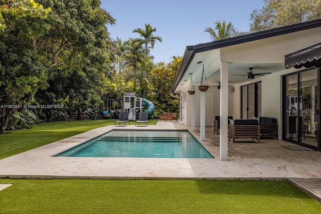 7921 SW 100th St, Miami, FL 33156 - outdoor pool with a patio, a yard, ceiling fan, and a playground