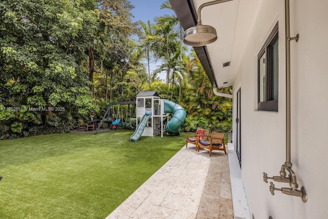 7921 SW 100th St, Miami, FL 33156 - view of green lawn featuring a playground